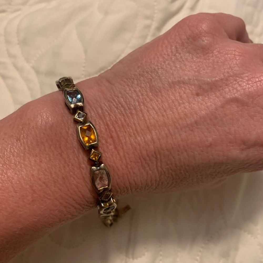 Multi colored stone bracelet. 7”. Gold plated.